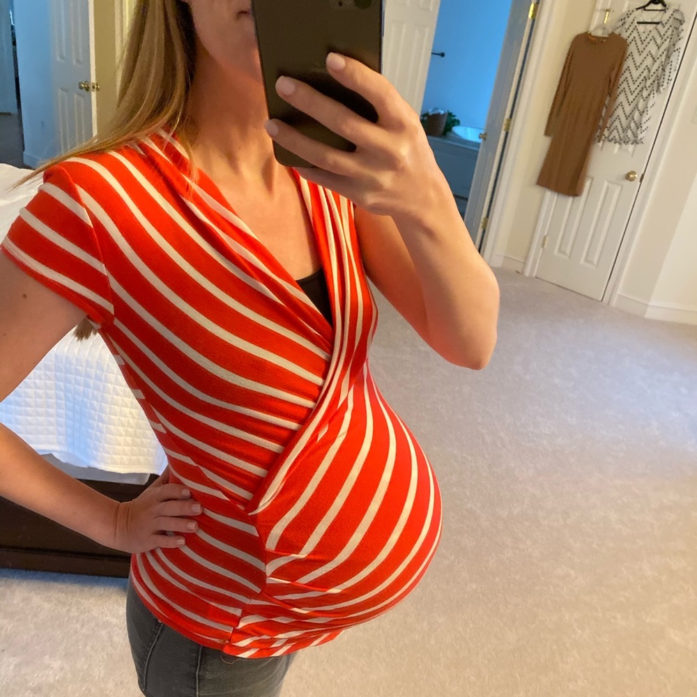 Coral and white maternity top.